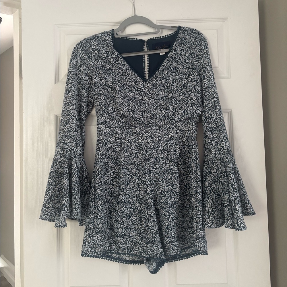 Francesca’s Floral Blue Bell Sleeve Romper